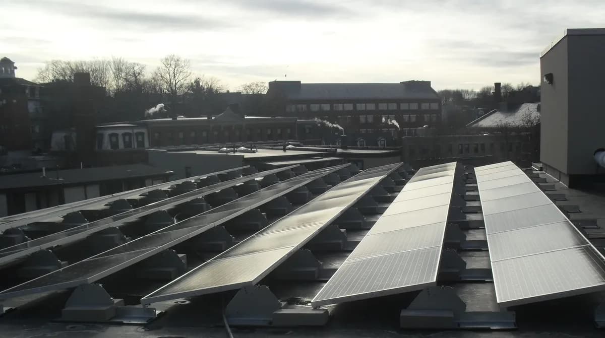 Rows of solar panels on the ISBCC roof in Roxbury